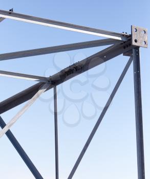 metal construction on a background of blue sky