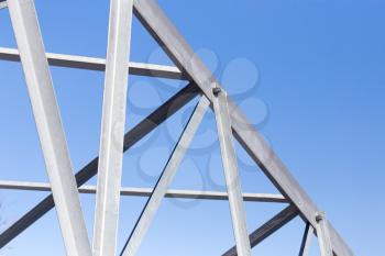 metal construction on a background of blue sky