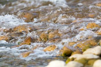 stones in the river as a backdrop