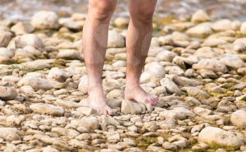 foot man on the stone ground