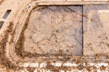 dirt on the glass car