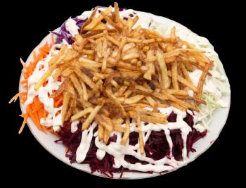 dish of fries with mayonnaise and vegetables on a black background