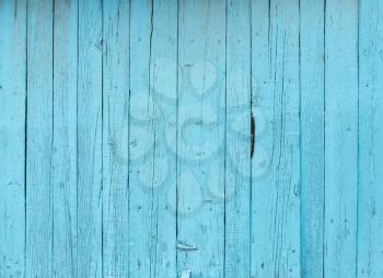 Wooden boards painted in blue as a background