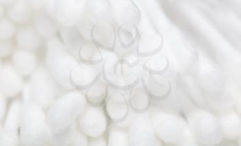 White eared cotton swabs as a background. Macro