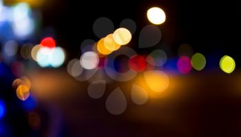 Bokeh at night in the city as a background .