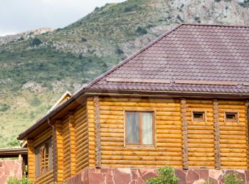 The roof of a country wooden house in nature
