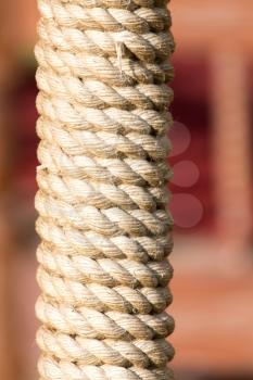 Rope twisted on the post as a background