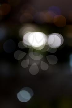 Bokeh at night in the city as a background .