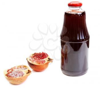 Royalty Free Photo of a Bottle of Juice and Pomegranate 