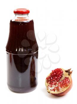 Royalty Free Photo of a Bottle of Juice and Pomegranate