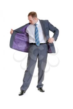 Royalty Free Photo of a Businessman Looking at His Coat
