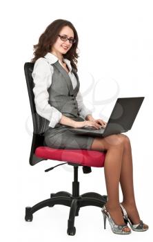 Royalty Free Photo of a Businesswoman Using a Laptop