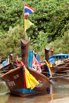Royalty Free Photo of Thai Boats in the Lagoon in the Jungle