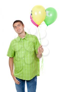 portrait of a smiling man holding balloons isolated on white background