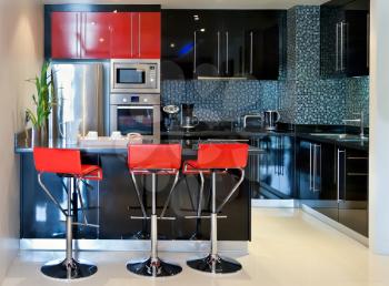 The kitchen chairs with red and black furniture