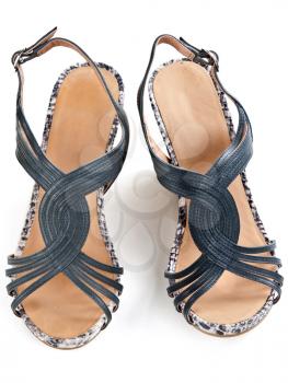 pair of women's sandals, top view on a white background