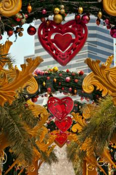 Outdoor Christmas decorations, a corridor of pine branches and hearts