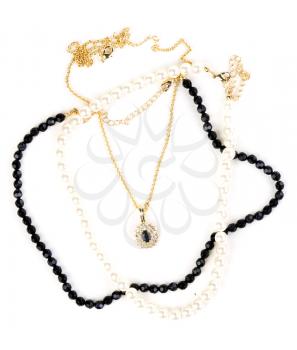 beads and chain with a pendant on a white background
