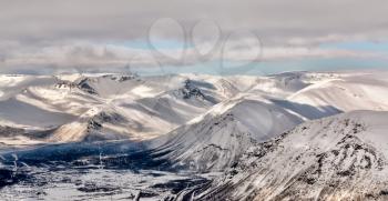 Landscape snowy mountain valley Khibiny