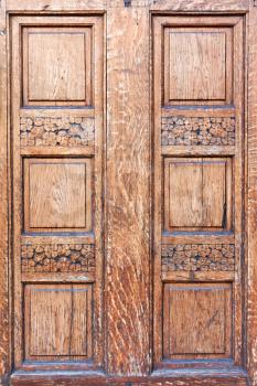 details of old wooden door with rich wood texture and lots of details