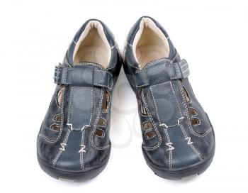 Pair of leather baby shoes. Isolate on white