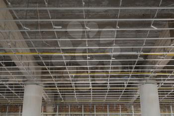 Suspended ceiling system under reconstruction building with columns