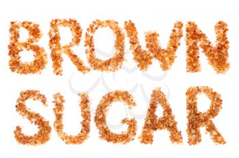 word BROWN SUGAR laid brown sugar. Isolate on white.