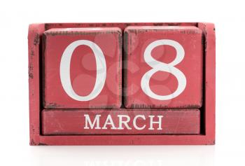 Red wooden calendar, March 8. Isolate on white.