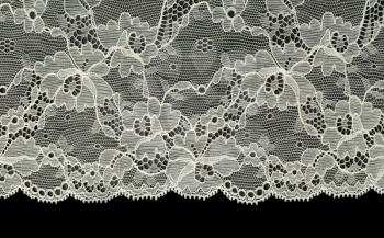 Bright openwork lace isolated on black background