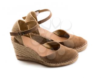 Pair of brown suede women's shoes. Isolate on white.