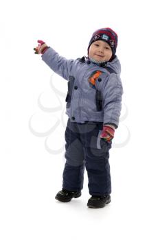 Three-year boy in winter clothes, studio. Isolate on white.