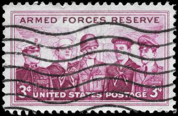 Royalty Free Photo of 1955 US Stamp Shows the Marine, Coast Guard, Army, Navy and Air Force Personnel