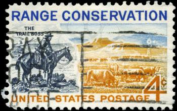 Royalty Free Photo of 1961 US Stamp Shows the Trail Boss and Modern Range, Conservation Issue