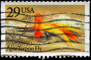 Royalty Free Photo of 1991 US Stamp Shows the Apte Tarpon Fly, Fishing Flies