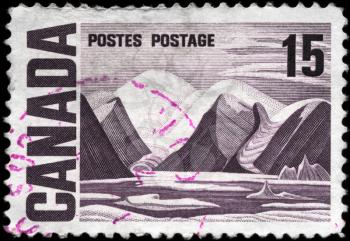CANADA - CIRCA 1967: A Stamp printed in CANADA shows the painting 
Bylot Island by Lawren Harris, series, circa 1967
