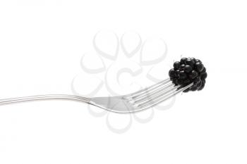 Royalty Free Photo of a Blackberry on a Fork