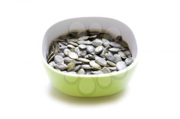 Royalty Free Photo of a Bowl of Pumpkin Seeds