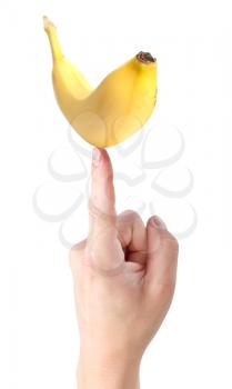 Royalty Free Photo of a Person Holding a Banana