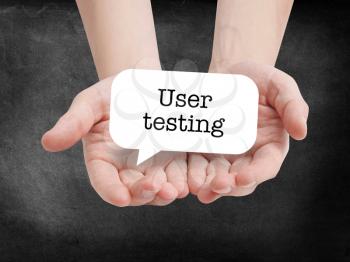 User testing written on a speechbubble