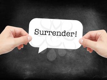Surrender written on a speechbubble