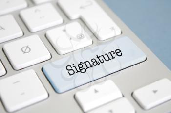 Signature written on a keyboard