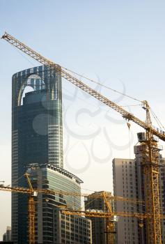 shanghai construction crane over modern building background