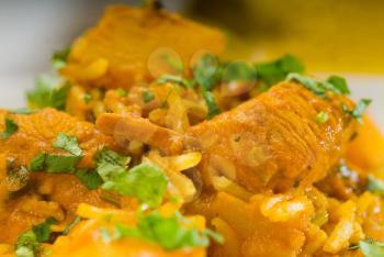 fresh home made curry beef rice and potatoes with ingredients around composition