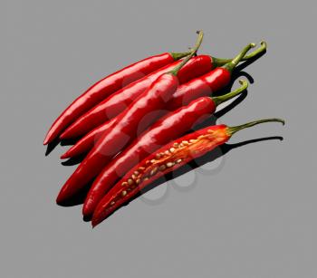 fresh red chili peppers over grey reflective surface