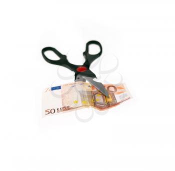 opened stainless scissors cutting euro bill  crisis methaphore closeup  isolated on white 