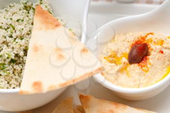 fresh traditional arab taboulii couscous with hummus