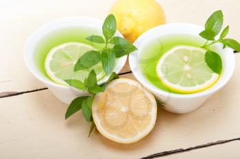 fresh and healthy mint infusion tea tisane with lemon