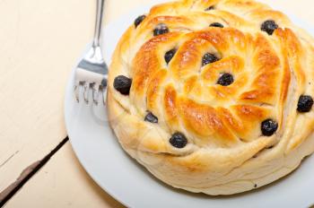 fresh home baked blueberry bread cake dessert over white wood table