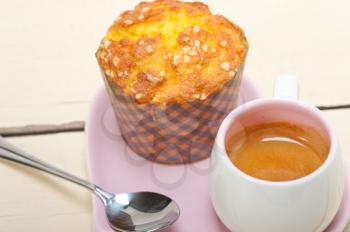 coffee and muffin served on a pink heart shaped dish