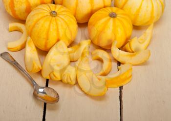 bunch of fresh yellow pumpkins just collected from garden 